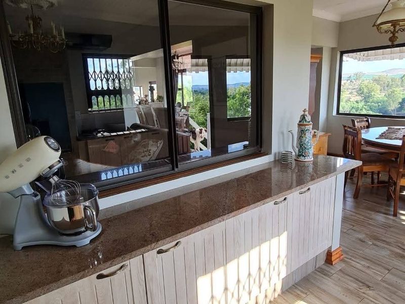 Spacious 5-Bedroom Home with River Views, Solar, and Top Security Features - Photo 9