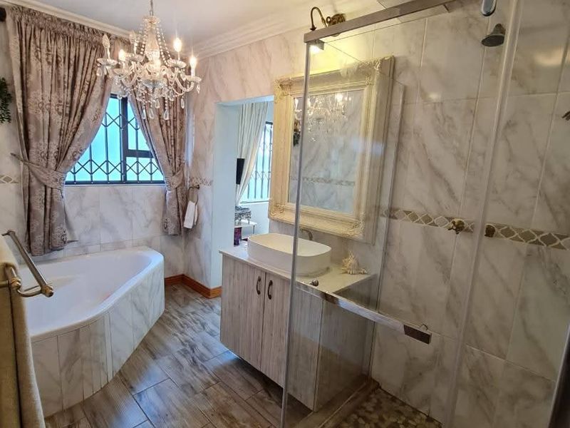 Spacious 5-Bedroom Home with River Views, Solar, and Top Security Features - Photo 3