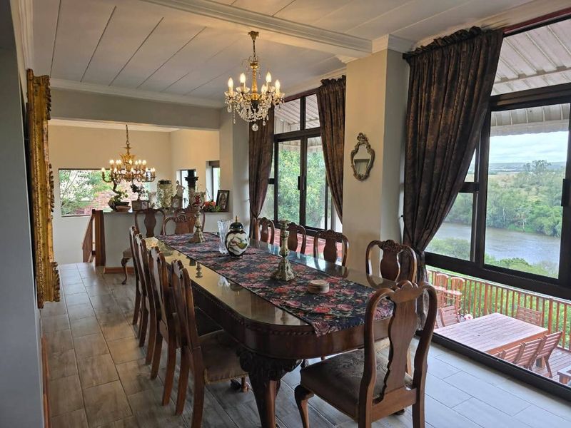 Spacious 5-Bedroom Home with River Views, Solar, and Top Security Features - Photo 10