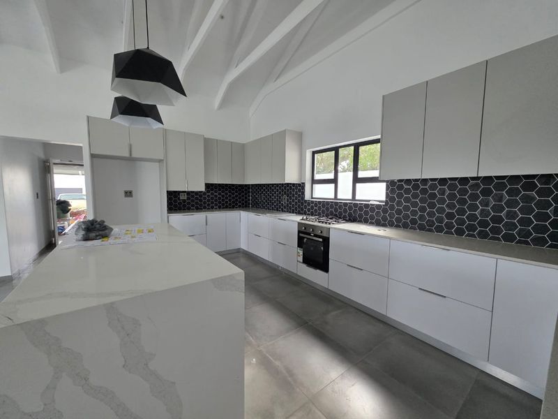 Modern Coastal Living in Shelley Point | 4-Bedroom Luxury Home - Photo 7