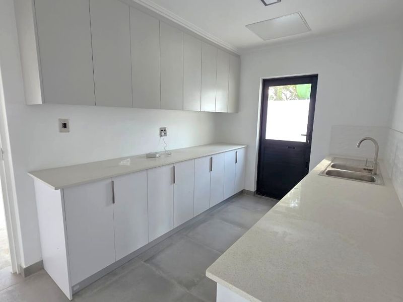 Modern Coastal Living in Shelley Point | 4-Bedroom Luxury Home - Photo 6