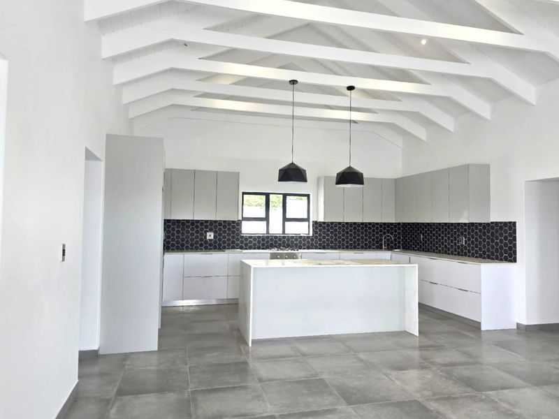 Modern Coastal Living in Shelley Point | 4-Bedroom Luxury Home - Photo 4