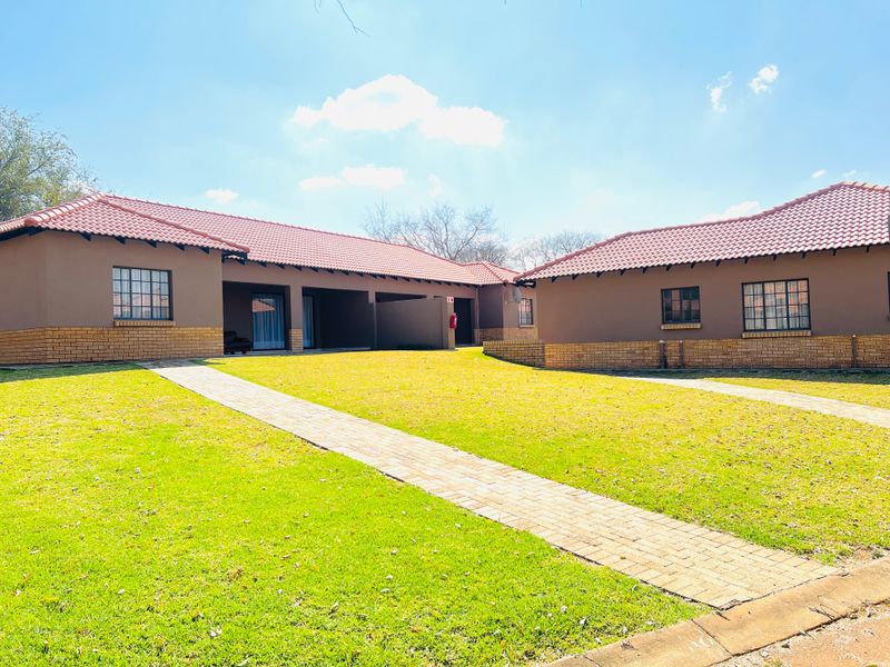 Experience luxury living in a secure Gated Estate - Photo 1