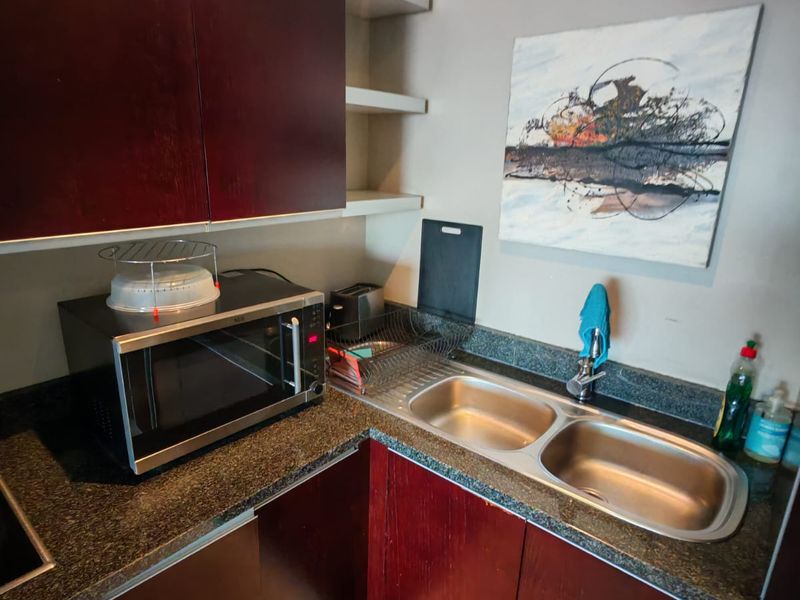 Experience modern city living in this stylish 1-bedroom apartment, now available to rent - Photo 10