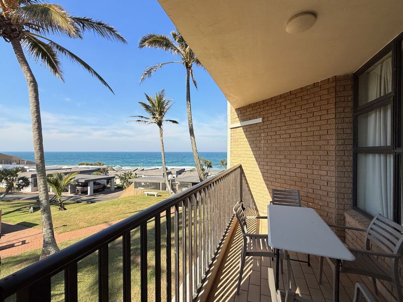 Beachfront Bliss with Sea Views & Strong Holiday Income - Photo 1
