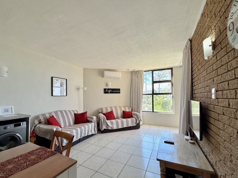 Beachfront Bliss with Sea Views & Strong Holiday Income - Photo 8