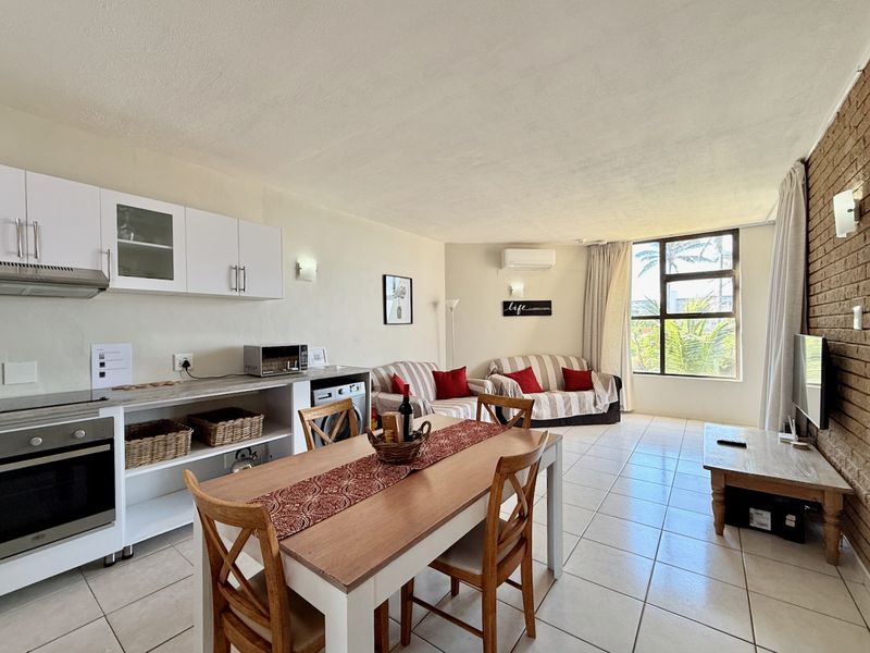 Beachfront Bliss with Sea Views & Strong Holiday Income - Photo 7