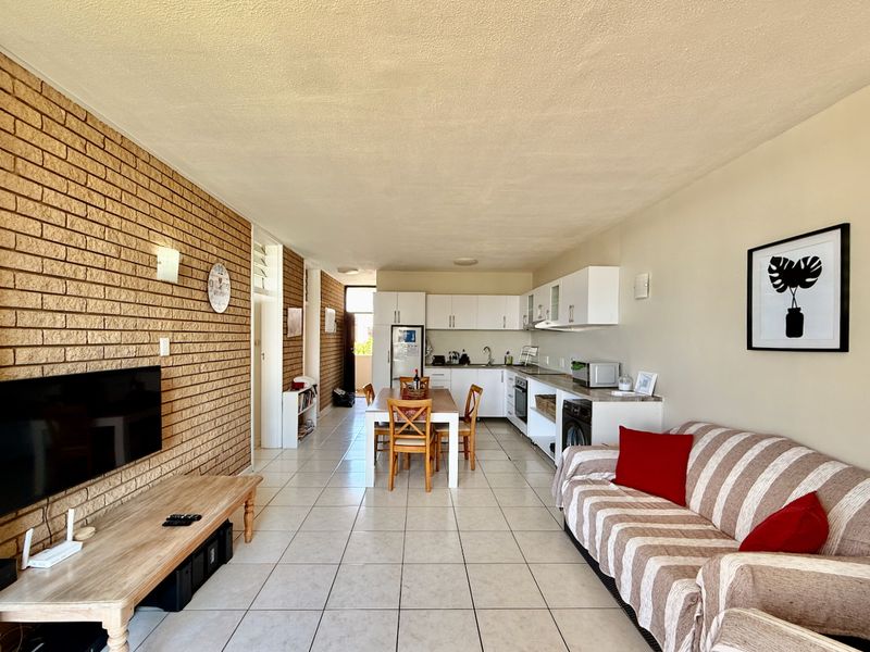 Beachfront Bliss with Sea Views & Strong Holiday Income - Photo 4