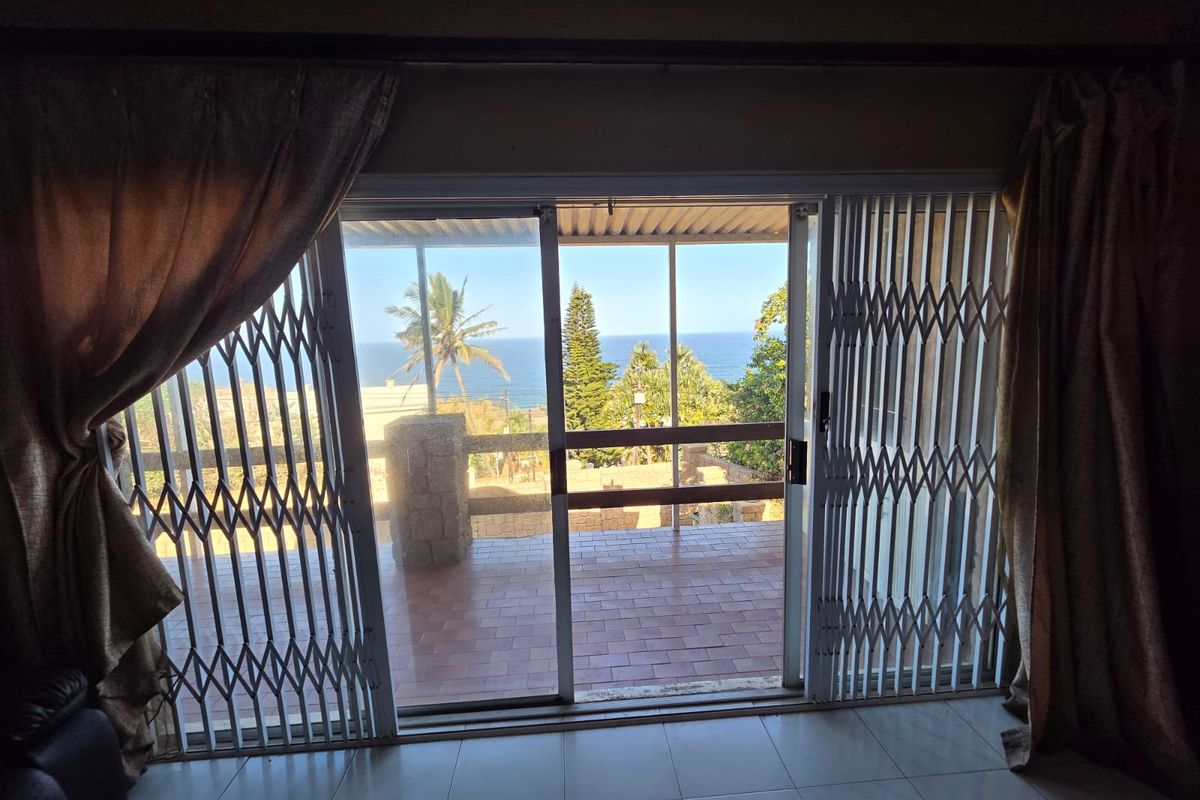 Sea Side Living Topped With Coastal Charm Awaits - Photo 2