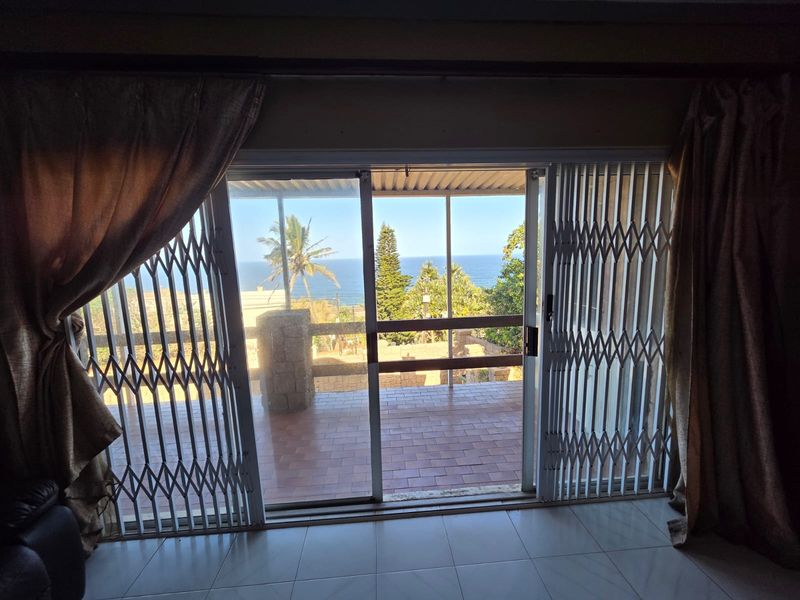 Sea Side Living Topped With Coastal Charm Awaits - Photo 2