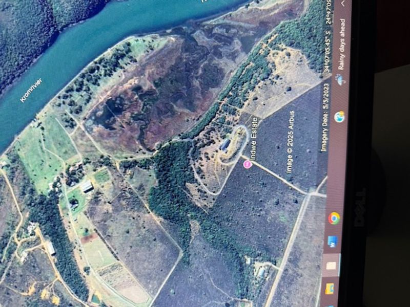Aerial view of the residential land plot located within Indwe Estate, featuring proximity to the Kromrivier and surrounding natural landscape.