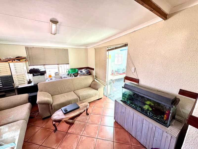 Spacious Family Home with Multiple Living Areas and indoor braai area for sale in Secunda - Photo 9