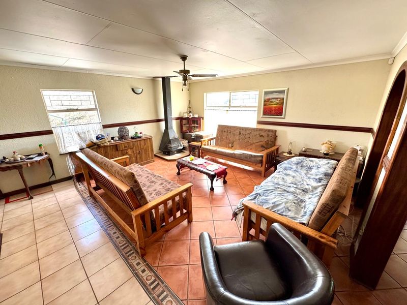 Spacious Family Home with Multiple Living Areas and indoor braai area for sale in Secunda - Photo 5