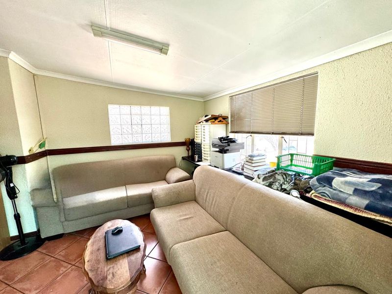 Spacious Family Home with Multiple Living Areas and indoor braai area for sale in Secunda - Photo 10