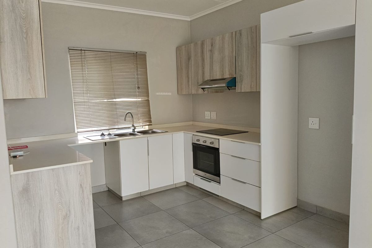 Modern apartment in Manor Estates - Investment or starter home! - Photo 3