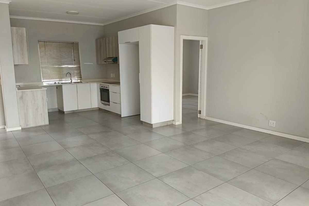 Modern apartment in Manor Estates - Investment or starter home! - Photo 2