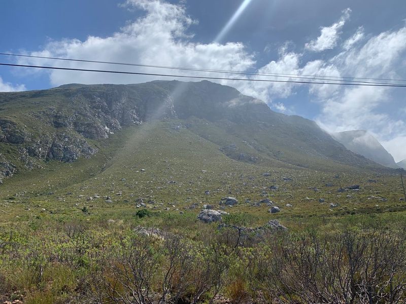 A scenic view of the mountain landscape surrounding the vacant residential property.