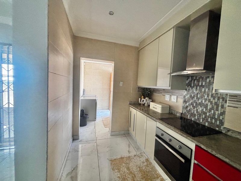 Modern 4-Bedroom Family Home with Pool & Entertainment Area! - Photo 10