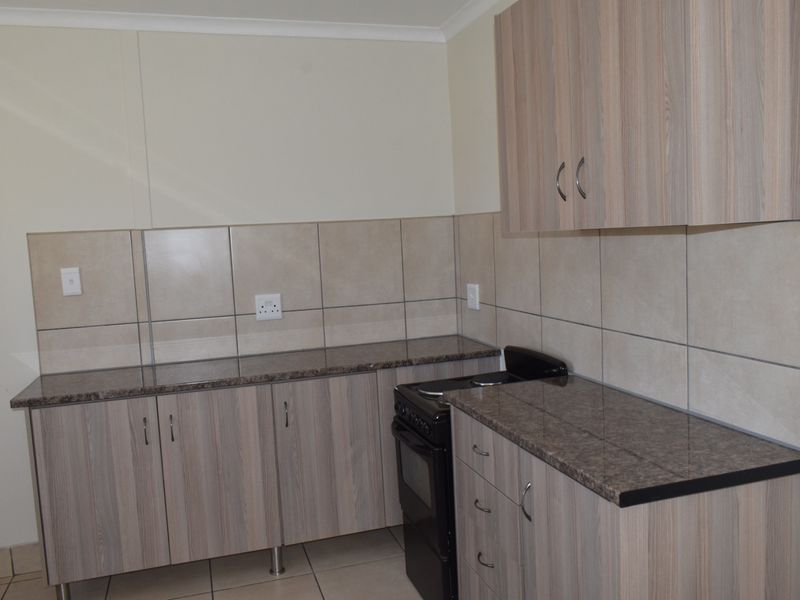 Affordable Luxury- 3 Bedroom House in a great Area - Photo 9