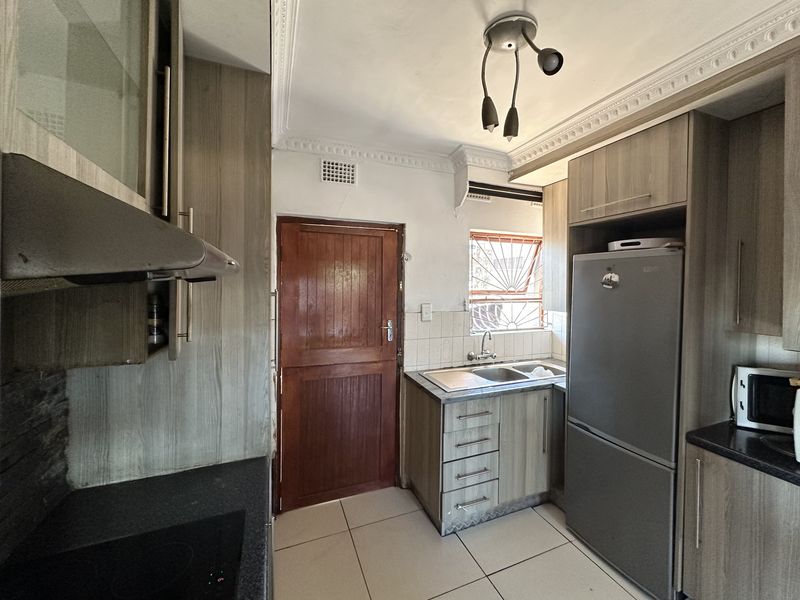 Step Into Home Ownership With This 3 Bedroom Home With Income Earning Potential - Photo 9