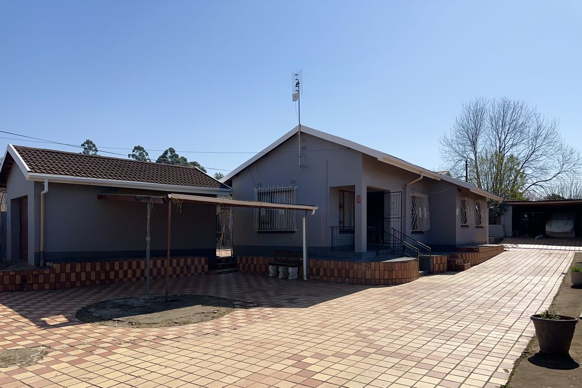Step Into Home Ownership With This 3 Bedroom Home With Income Earning Potential - Photo 2