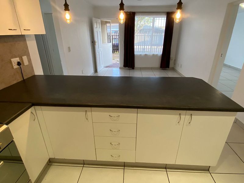 Well-Maintained 3-Bedroom Home with Braai Area - Photo 9