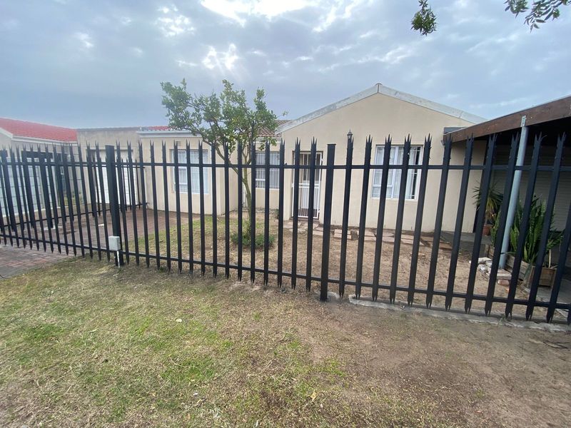 Well-Maintained 3-Bedroom Home with Braai Area - Photo 1