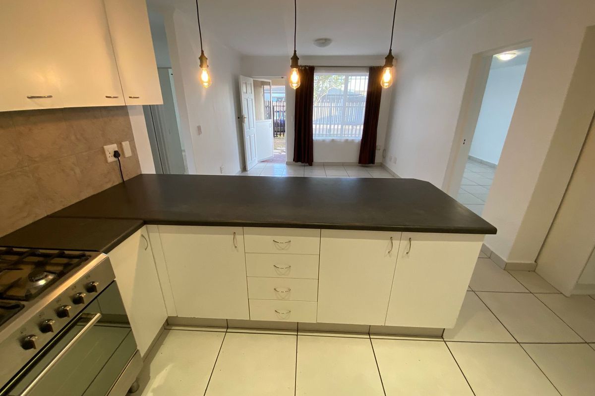 Well-Maintained 3-Bedroom Home with Braai Area - Photo 4