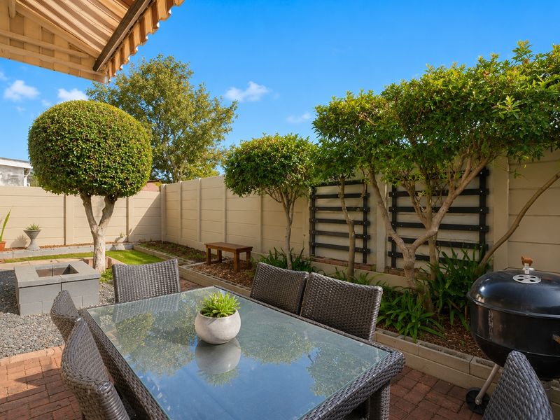 Secure and Stylish Gem in a Beautifully Maintained Complex - Photo 1