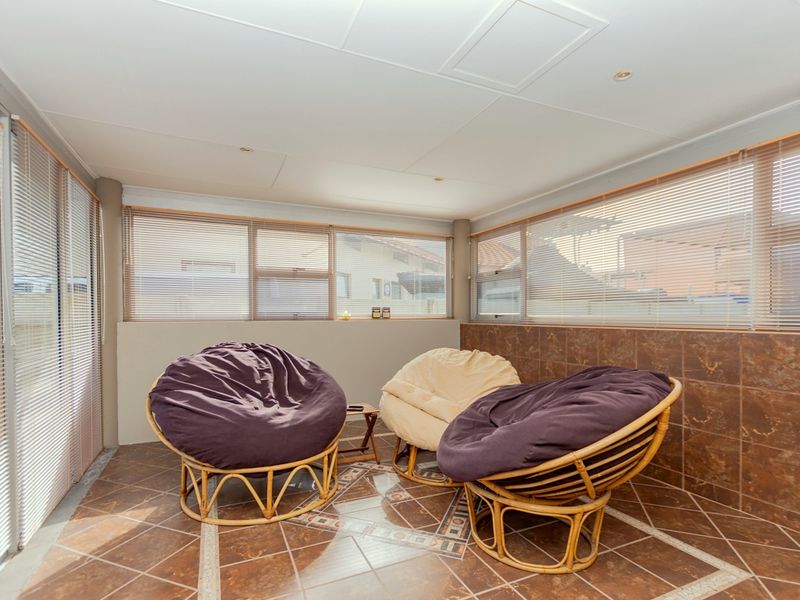 This modern home offers the perfect layout for permanent residence with the convenience of a lock-up - Photo 4