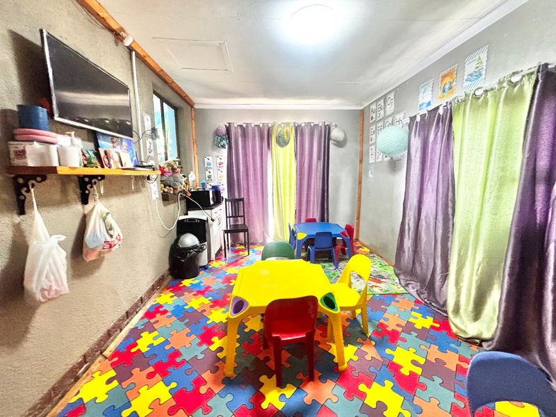 House with Registered Business Rights and Thriving Daycare Facility – Prime Investment Opportunity! - Photo 8