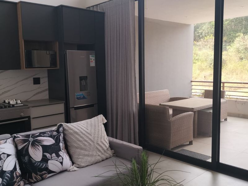 Modern 3-Bedroom Loft-Style Apartment in Zimbali Lakes - Photo 4