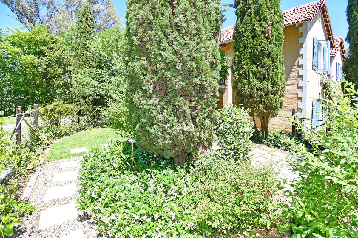 French-Style 4-Bedroom Home with Two Cottages – Fully Tenanted Income Property - Photo 2