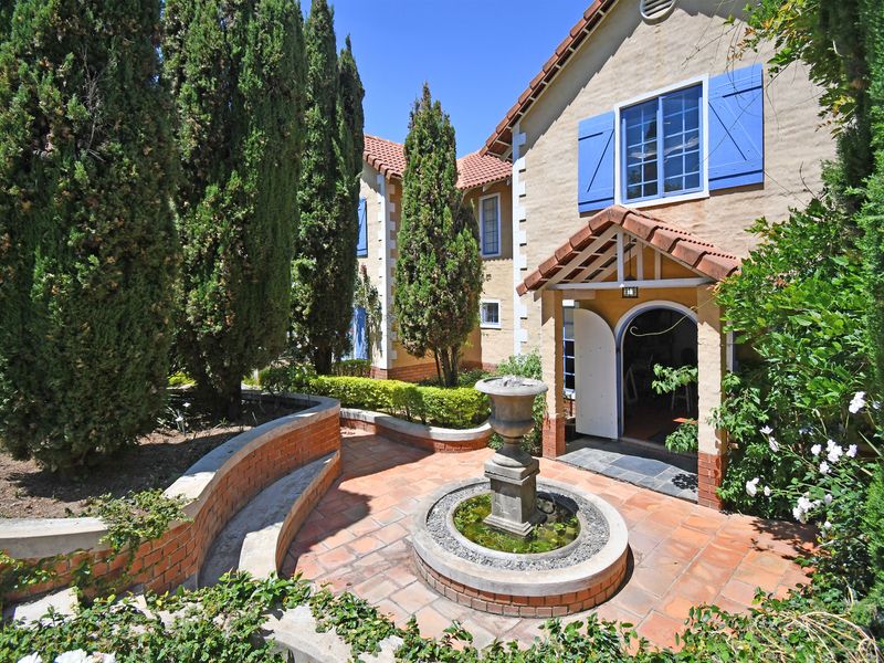 French-Style 4-Bedroom Home with Two Cottages – Fully Tenanted Income Property - Photo 1