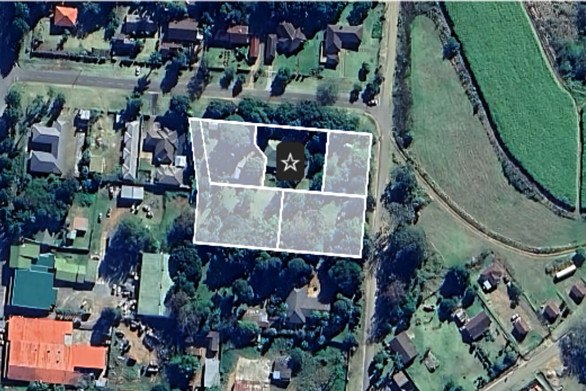 An aerial satellite view showing the property boundaries and surrounding neighborhood layout.