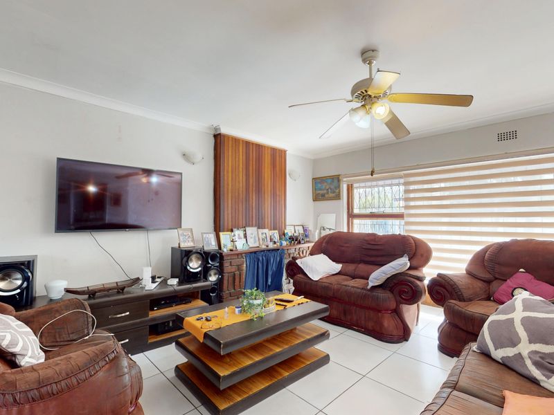 Warm & Welcoming 4-Bedroom Family Home with Entertainment Area and Endless Potential - Photo 2