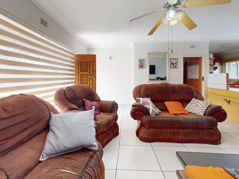 Warm & Welcoming 4-Bedroom Family Home with Entertainment Area and Endless Potential - Photo 9