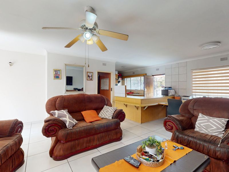 Warm & Welcoming 4-Bedroom Family Home with Entertainment Area and Endless Potential - Photo 10