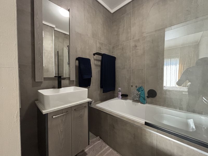 Modern 2-Bedroom Ground Floor Home in Secure Rynfield Complex - Photo 8