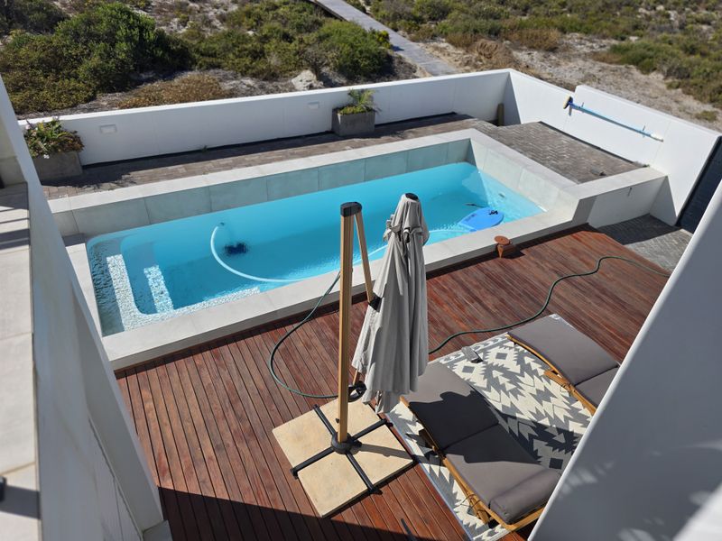 Coastal Luxury Redefined – Designer Beachfront Home with Panoramic Ocean Views - Photo 5