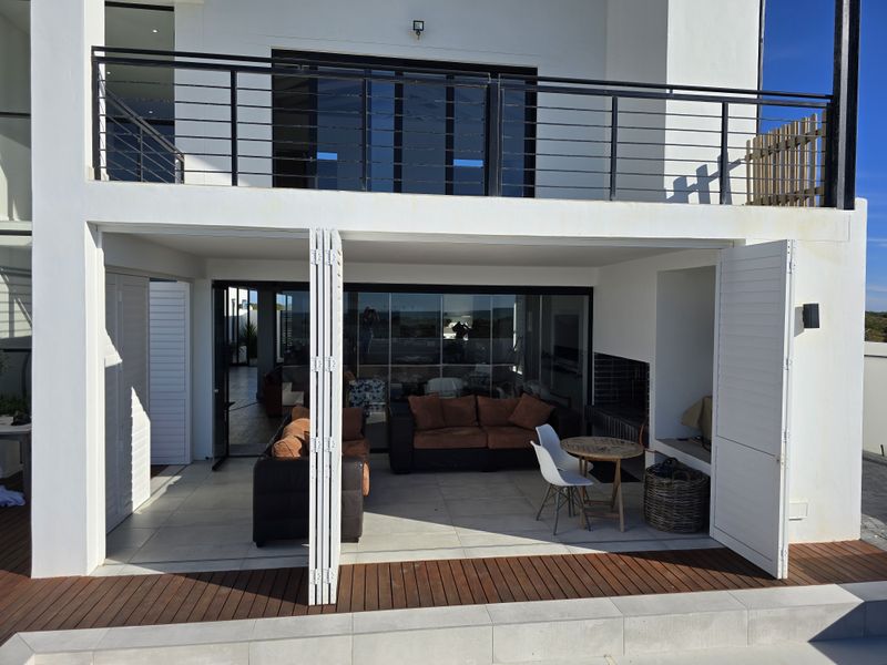 Coastal Luxury Redefined – Designer Beachfront Home with Panoramic Ocean Views - Photo 7