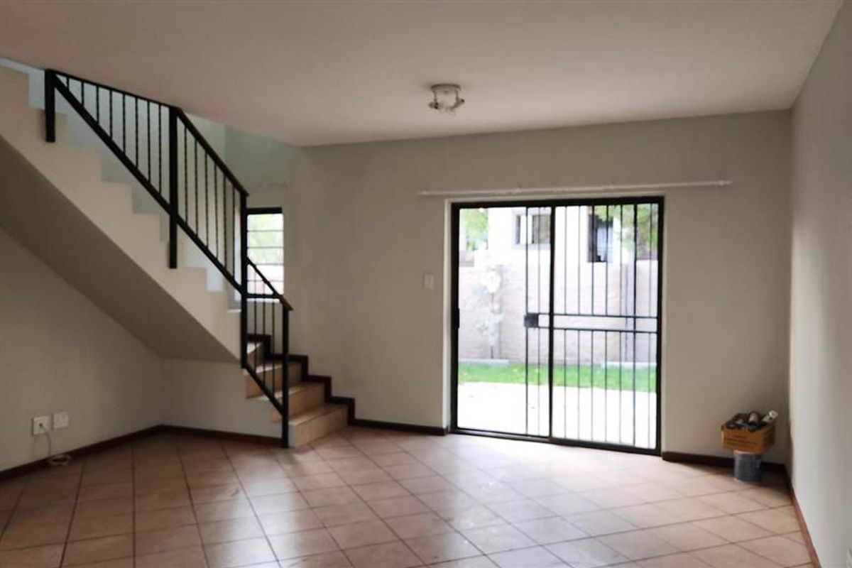 Charming 2-Bedroom Duplex — Ready to Become Your Home - Photo 3