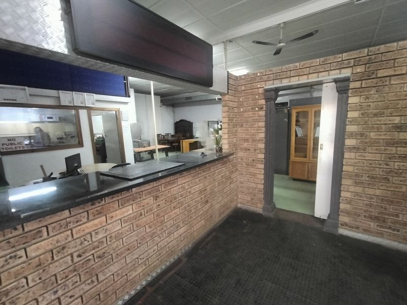 Solid Investment: Zoned Commercial Property with Offices & Overhead Cranes - Photo 4