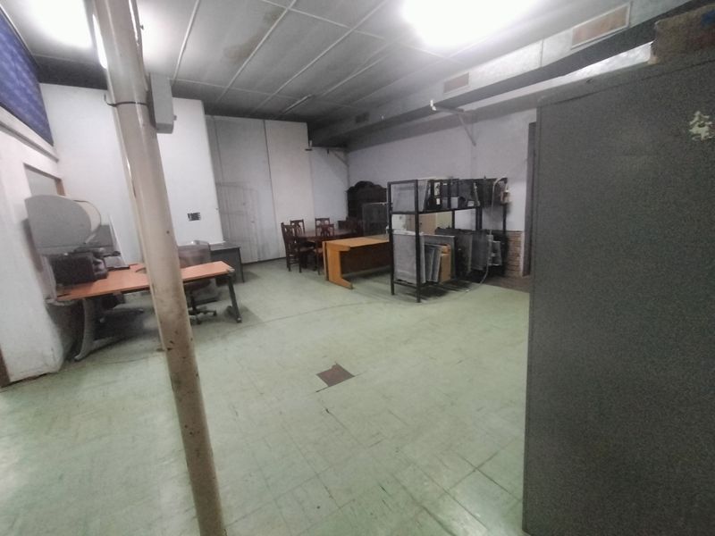 Solid Investment: Zoned Commercial Property with Offices & Overhead Cranes - Photo 9