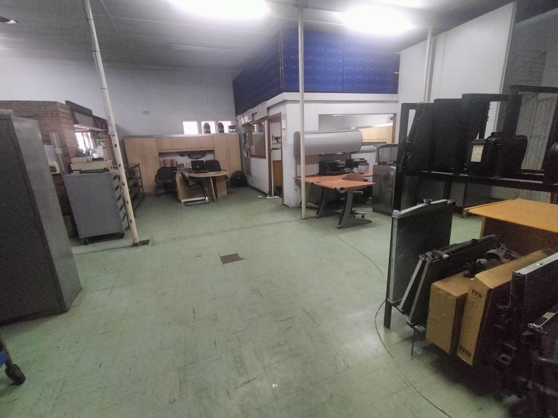 Solid Investment: Zoned Commercial Property with Offices & Overhead Cranes - Photo 8