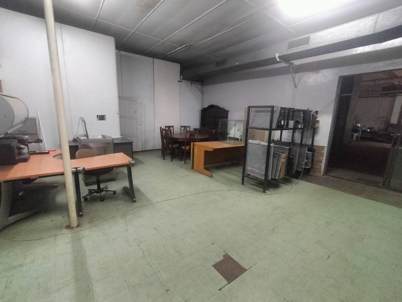 Solid Investment: Zoned Commercial Property with Offices & Overhead Cranes - Photo 6