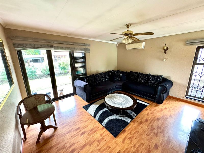 Spacious Family Home with Income Generating Flatlet and Versatile Outdoor Space - Photo 4