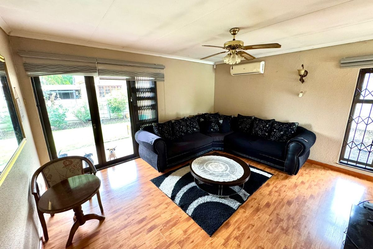 Spacious Family Home with Income Generating Flatlet and Versatile Outdoor Space - Photo 4