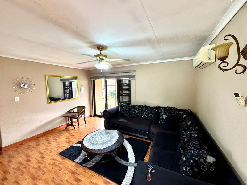 Spacious Family Home with Income Generating Flatlet and Versatile Outdoor Space - Photo 5