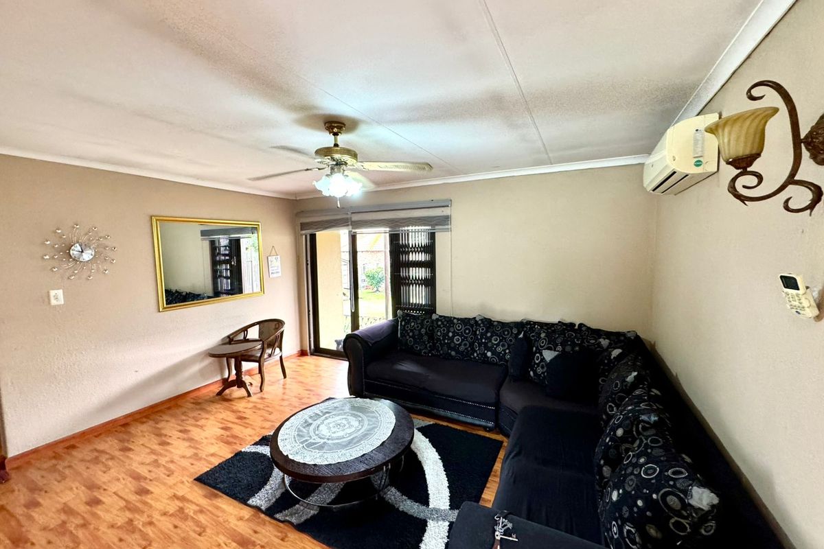 Spacious Family Home with Income Generating Flatlet and Versatile Outdoor Space - Photo 5